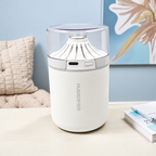 White cup humidifier with a clear upper cover, side USB port and control button