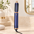 Blue and gold air styler with a round brush attachment