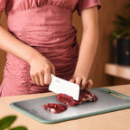Small double sided cutting board for everyday preparation.