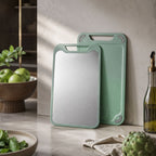 Stainless steel cutting board shown with food preparation ingredients.