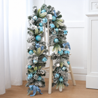 Blue decorated Christmas garland displayed on a stand