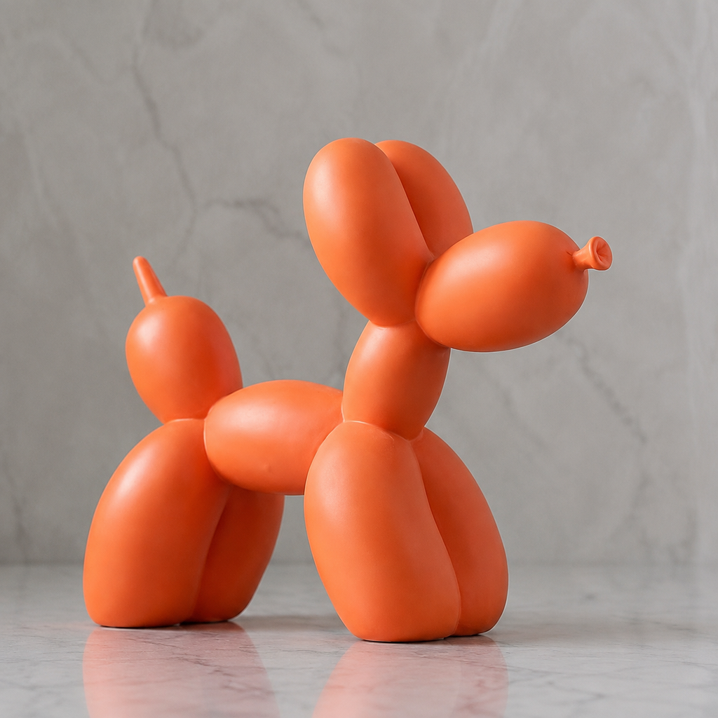 Balloon dog sculpture in glossy orange resin against a pale stone wall