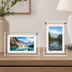 Horizontal and vertical digital photo frame pair displaying mountain landscapes.