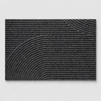 Gray geometric door mat shown alone on a neutral light gray studio background.