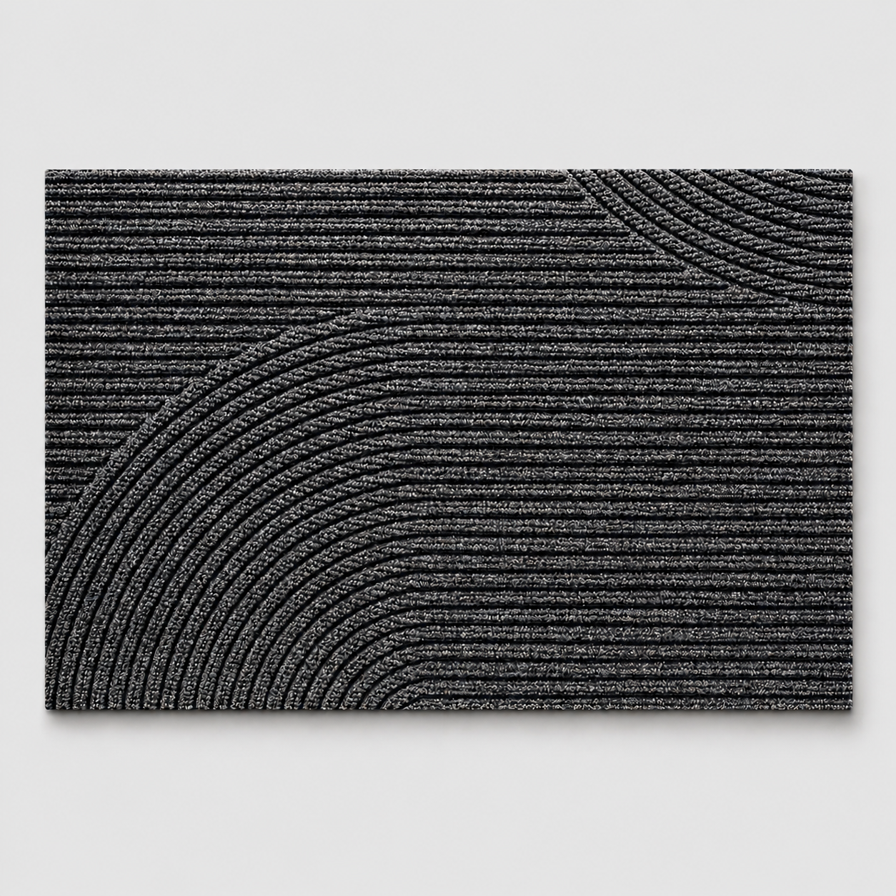 Gray geometric door mat shown alone on a neutral light gray studio background.