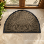 Beige brown semi-circular sunburst door mat centered on an ivory tile entry floor.