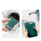 Green heating pad shown during cleaning and rinsing