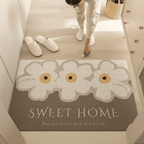 Entry mat with a floral Sweet Home print shown from above.
