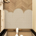 Entry mat with a beige abstract line print placed across a doorway.