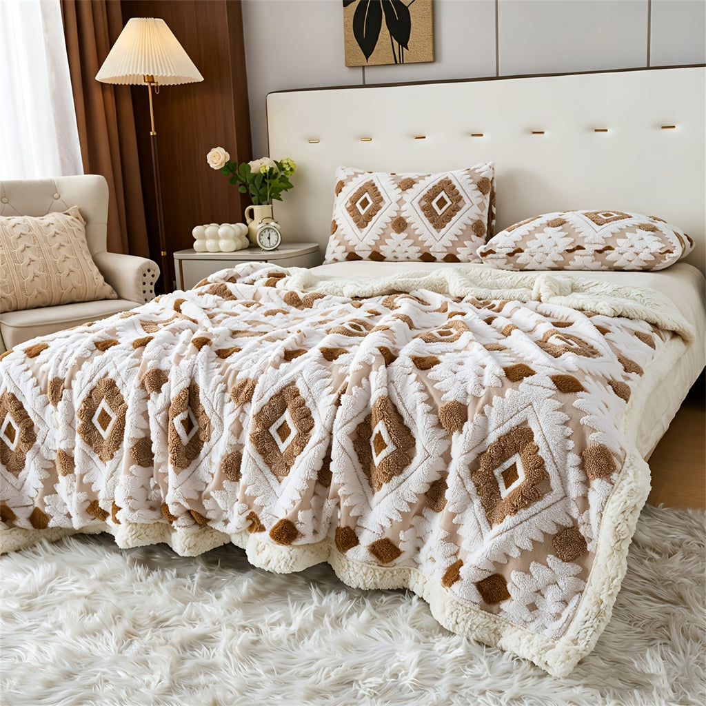 Brown and white diamond patterned faux fur blanket spread across a bed.