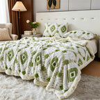Green and white diamond patterned faux fur blanket spread across a bed.