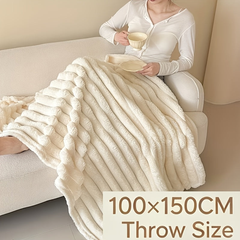 White striped blanket on a woman's lap with a 100 by 150 centimeter size caption.