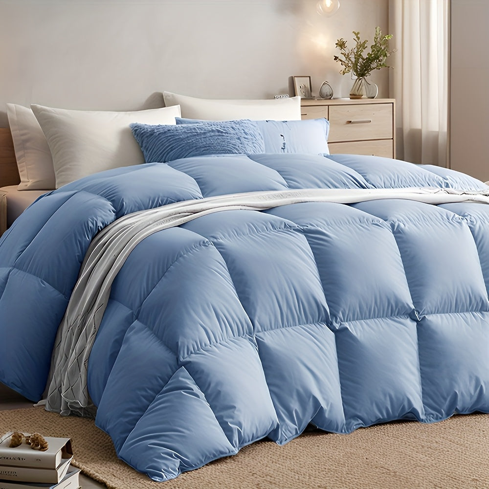 Blue quilted duvet on a bed