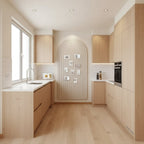 Felt pinboard in camel displaying notes and photos on a kitchen wall.