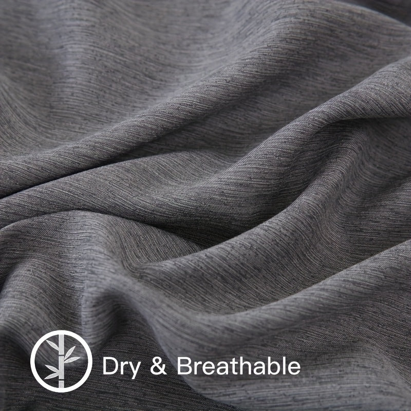 Fitted sheet fabric close-up with a breathability label
