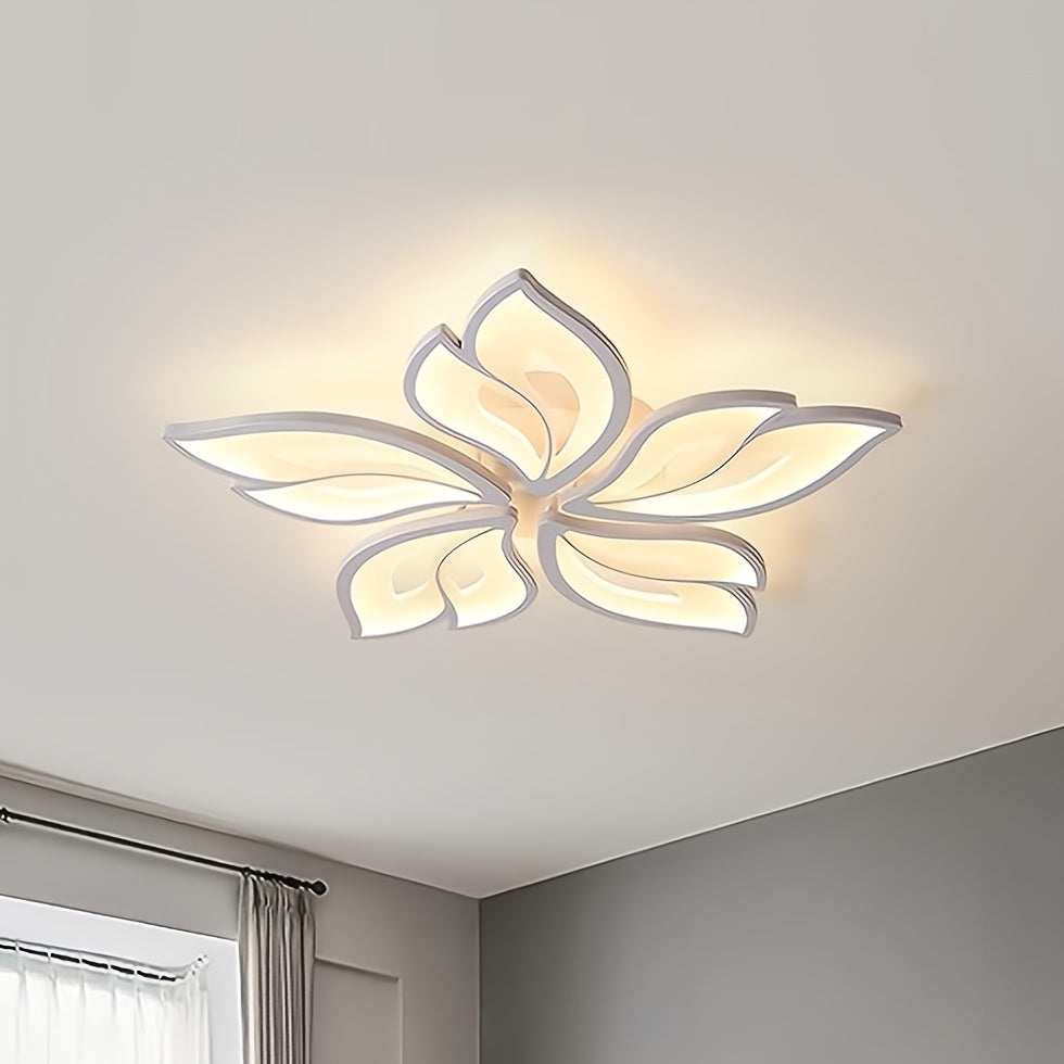 White five petal LED ceiling light above a bright living area