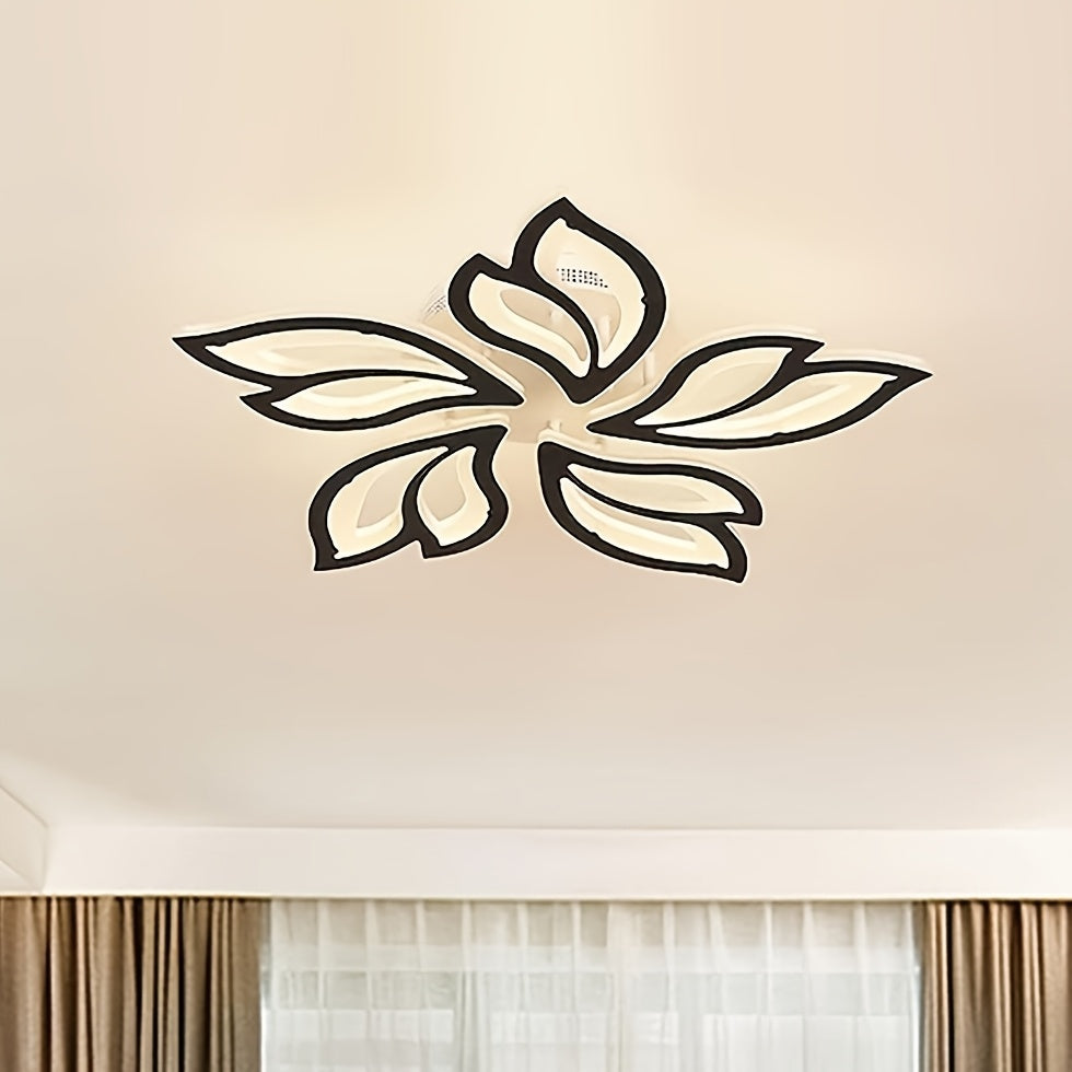 Black floral LED ceiling light illuminated above curtains