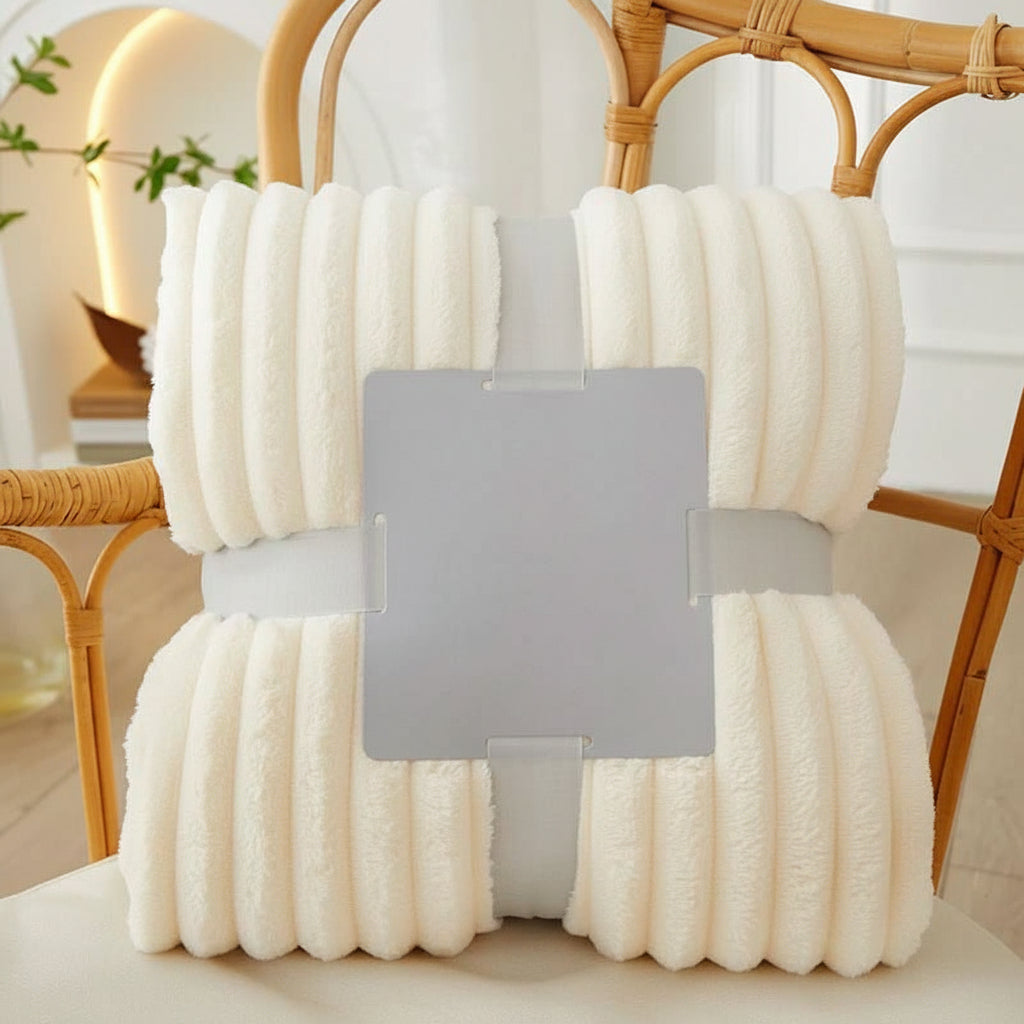 Flannel fleece blanket arranged to show its soft polyester finish.