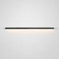 Slim black wall light mounted horizontally on a neutral wall with a soft downward glow.