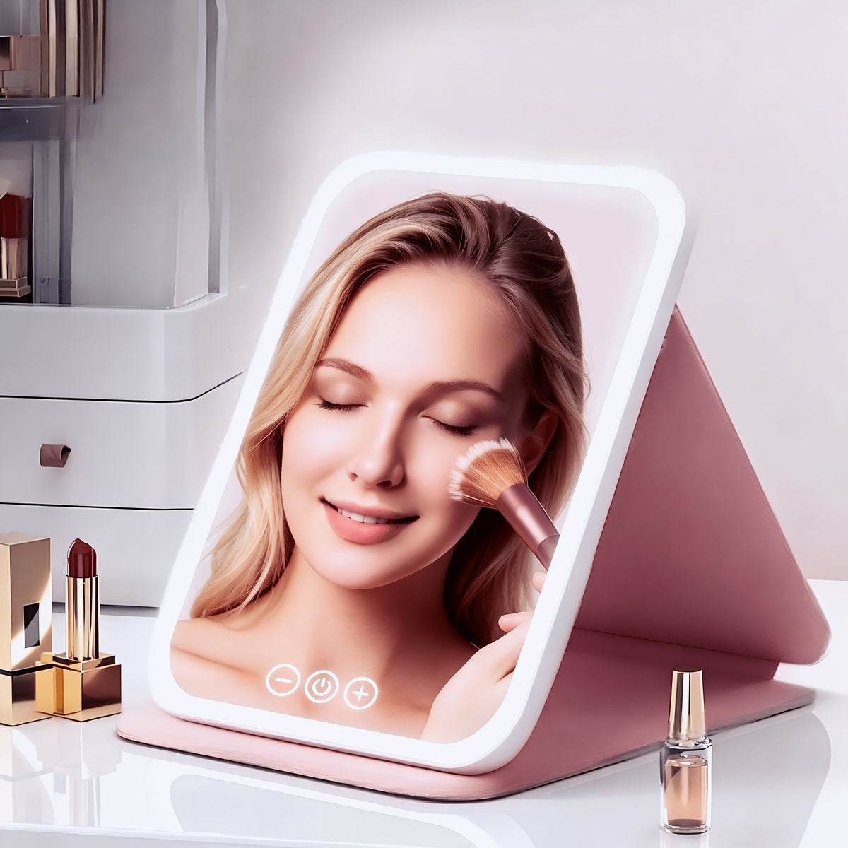 Pink foldable makeup mirror shown at an angle