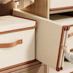 Beige foldable storage box shown collapsed beside an open box.