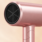 Close detail of the pink dryer intake grille and folding hinge
