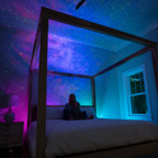 Black ABS and PVC projector with glowing lens detail