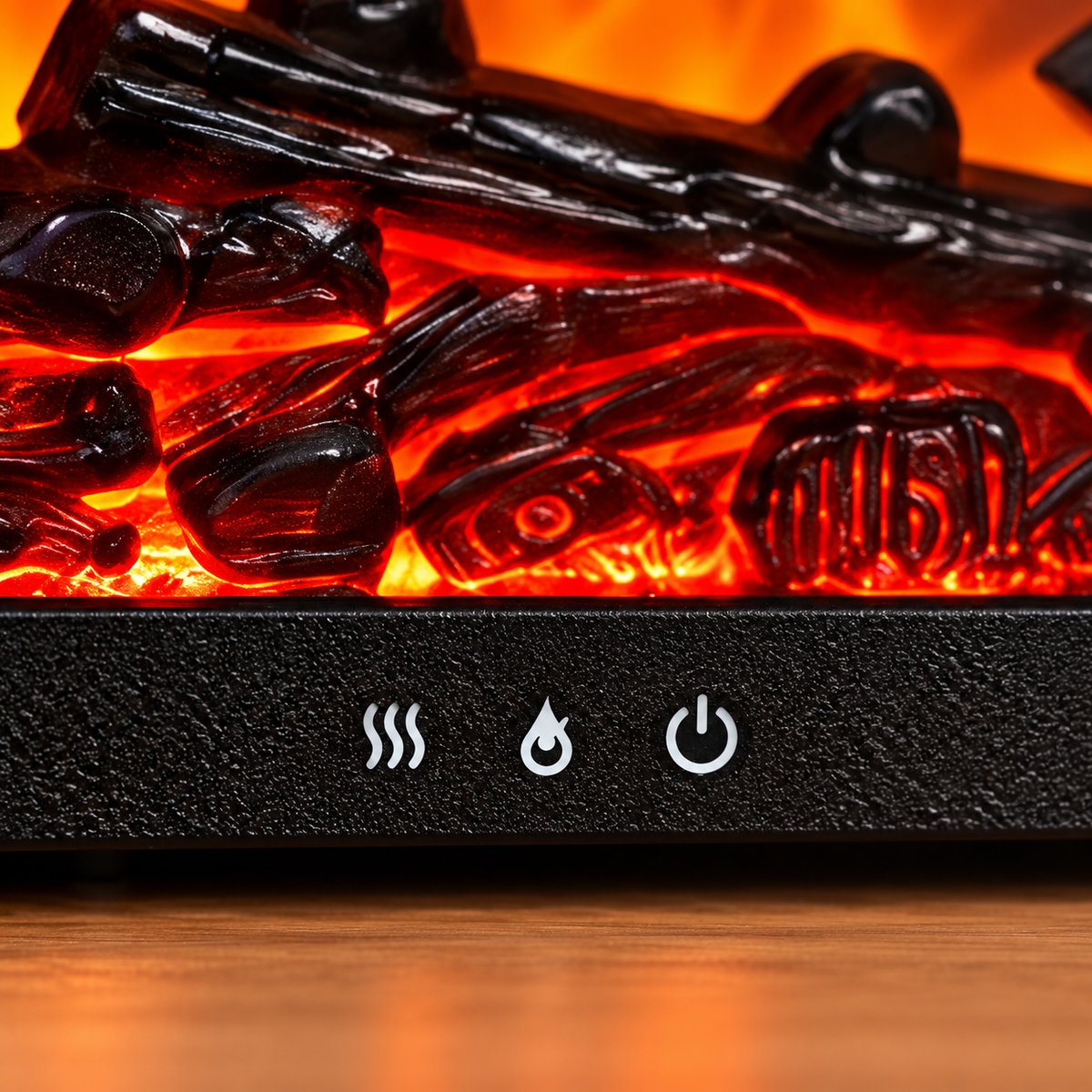 Close-up of the fireplace diffuser three lower front control icons