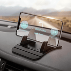 Black silicone dashboard phone mount in a car