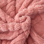 Pink geometric fleece texture close-up