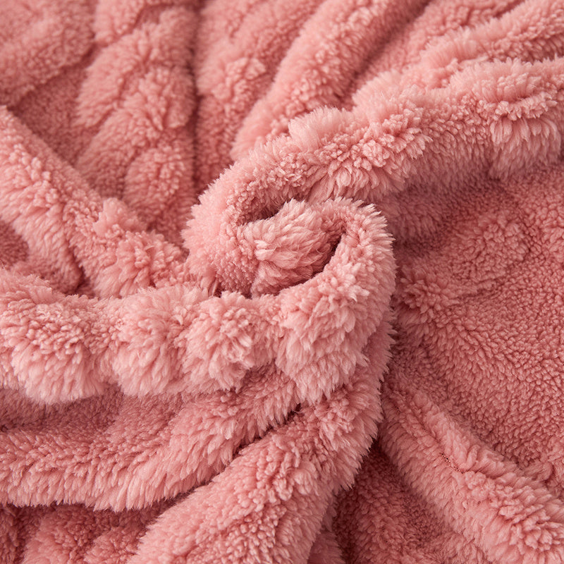 Pink geometric fleece texture close-up