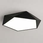 Black geometric LED ceiling light glowing on a clean neutral background.