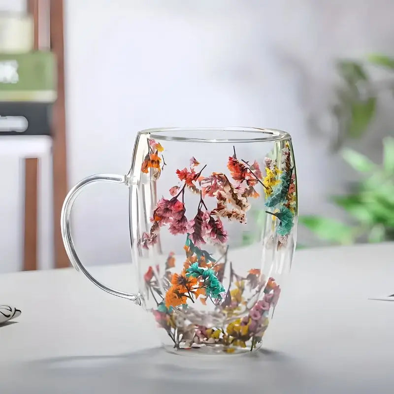 Clear double wall glass mug with colorful flower decoration