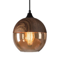 Rounded glass pendant light with wood look metal upper shade and amber glass