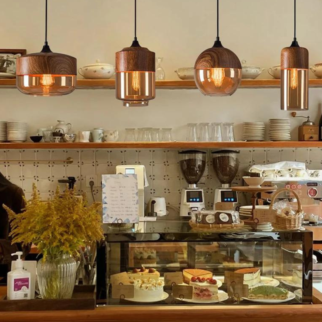 Glass pendant light styles hanging above a cafe counter