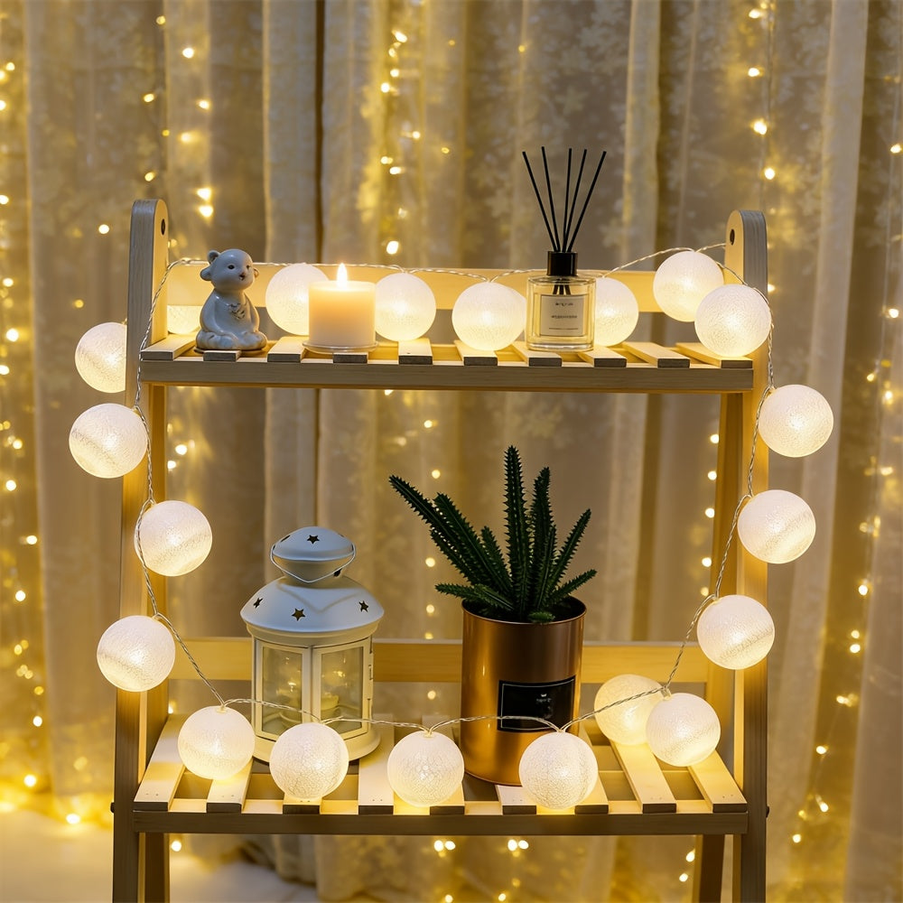 Globe fairy lights framing a shelf with decorative objects.