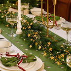 Gold star garland arranged along a festive dining table.