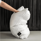 Goose down pillow with a soft breathable finish, lifestyle view.