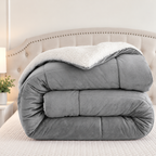 Refreshed folded gray comforter photograph