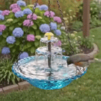 Blue hanging bird bath holding water beside flowering plants.