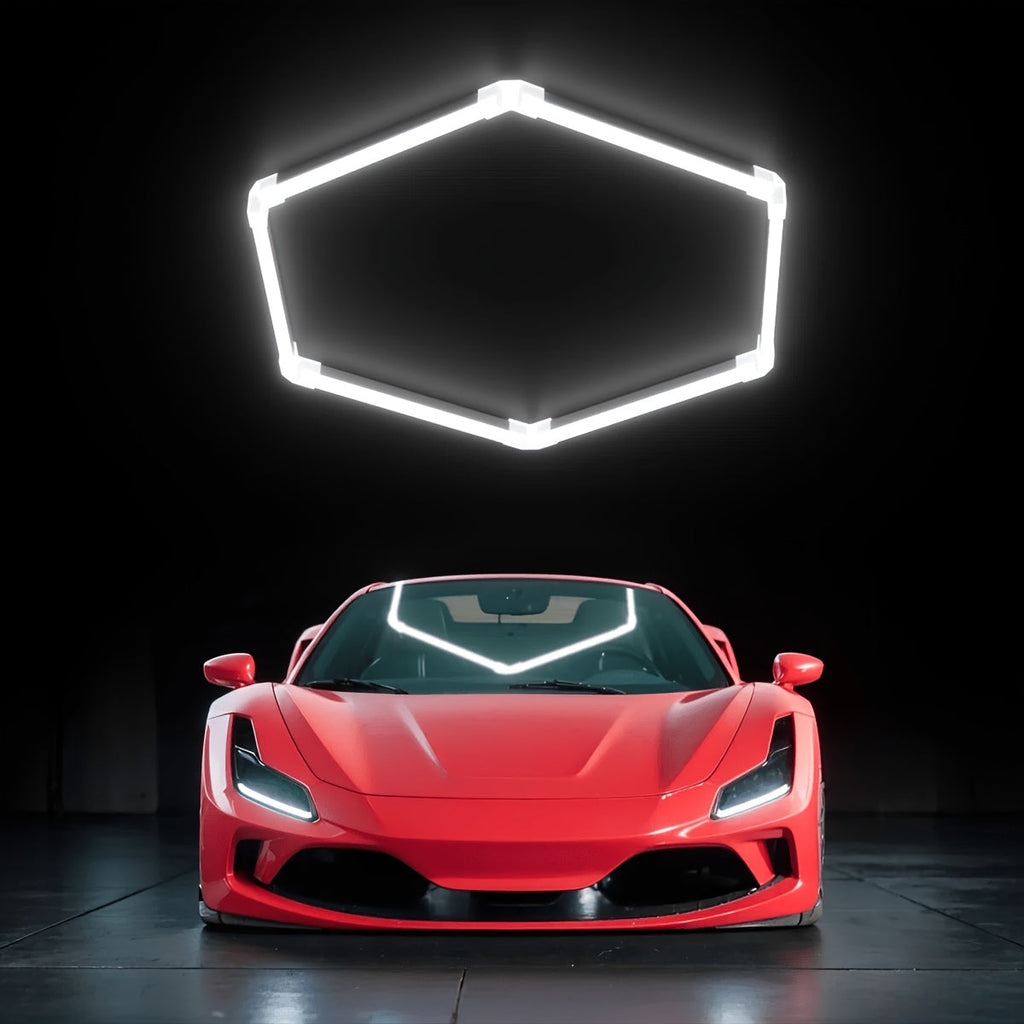 Hexagon LED garage light with one illuminated grid above a red car.