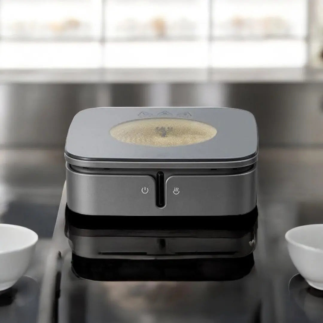 Gray ceramic hot plate with front touch controls