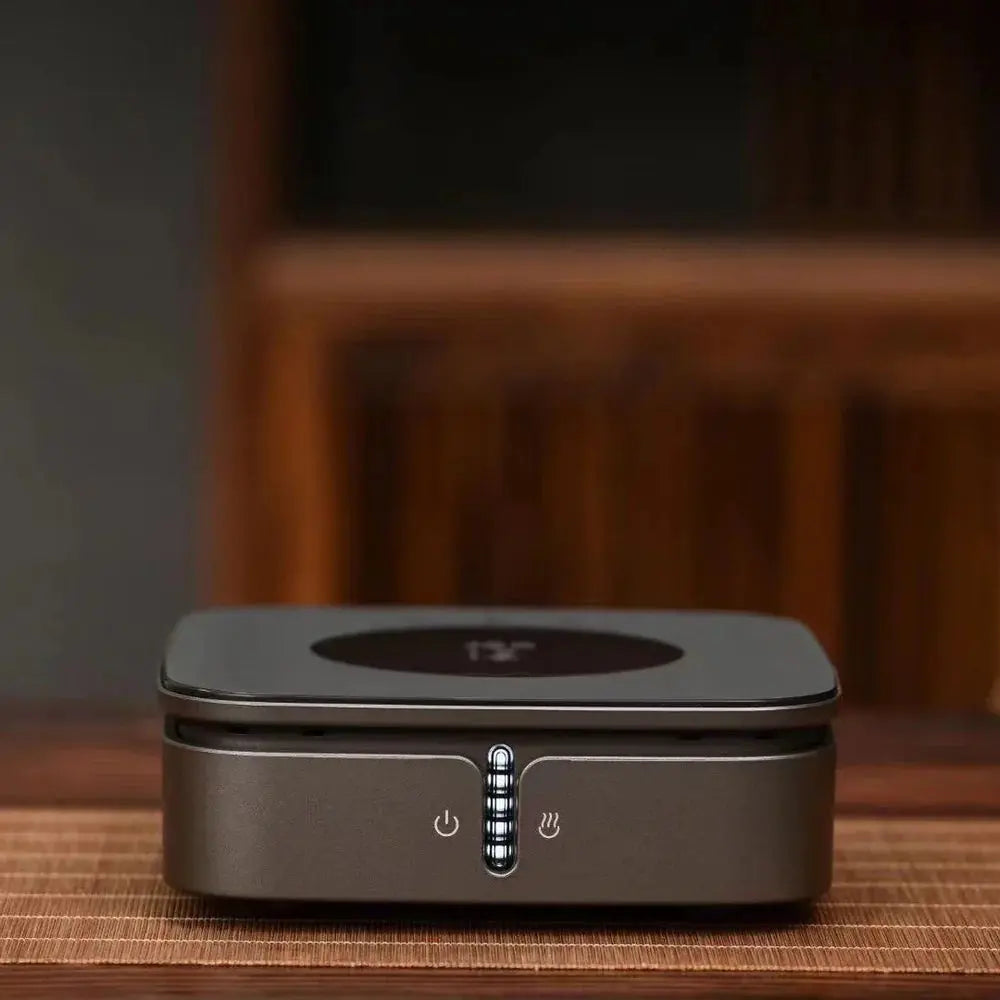Gray ceramic hot plate with front touch controls