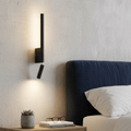Minimalist integrated LED wall light in black or white, hero view.