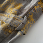 Gray kimono bathrobe fabric and belt with yellow patterned details.