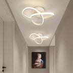 White clover LED ceiling light fixtures shown in a hallway