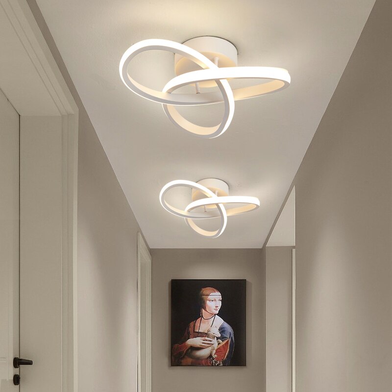 White clover LED ceiling light fixtures shown in a hallway