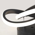 LED ceiling light close-up showing the curved light element