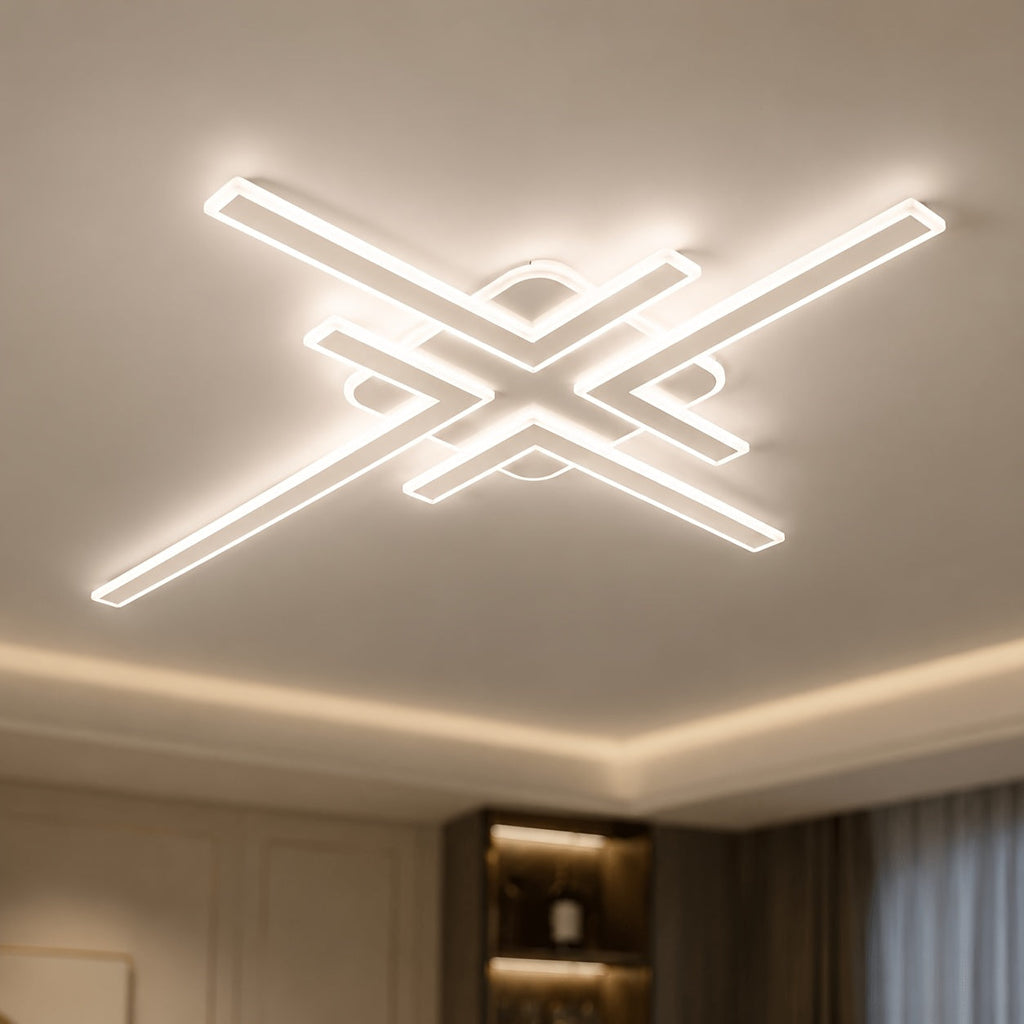 White geometric cross line LED ceiling light shown close to a ceiling.