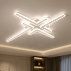 White geometric cross line LED ceiling light shown close to a ceiling.